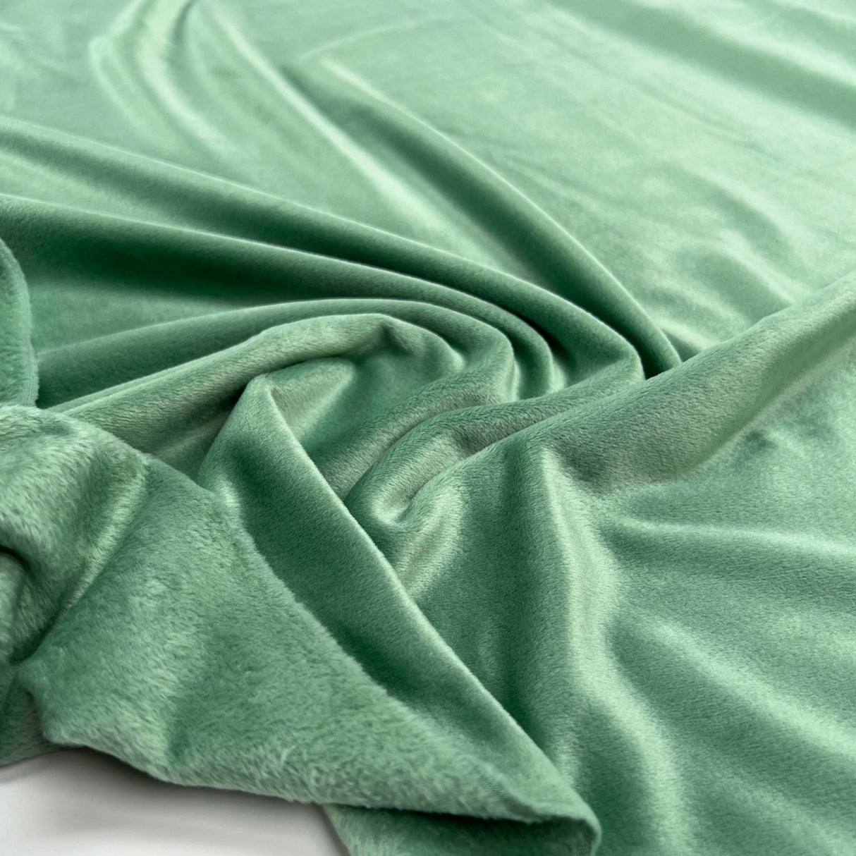 Comfort Velour Mint Green Polyester Elastane Soft Fleece Jersey Fabric Close up 