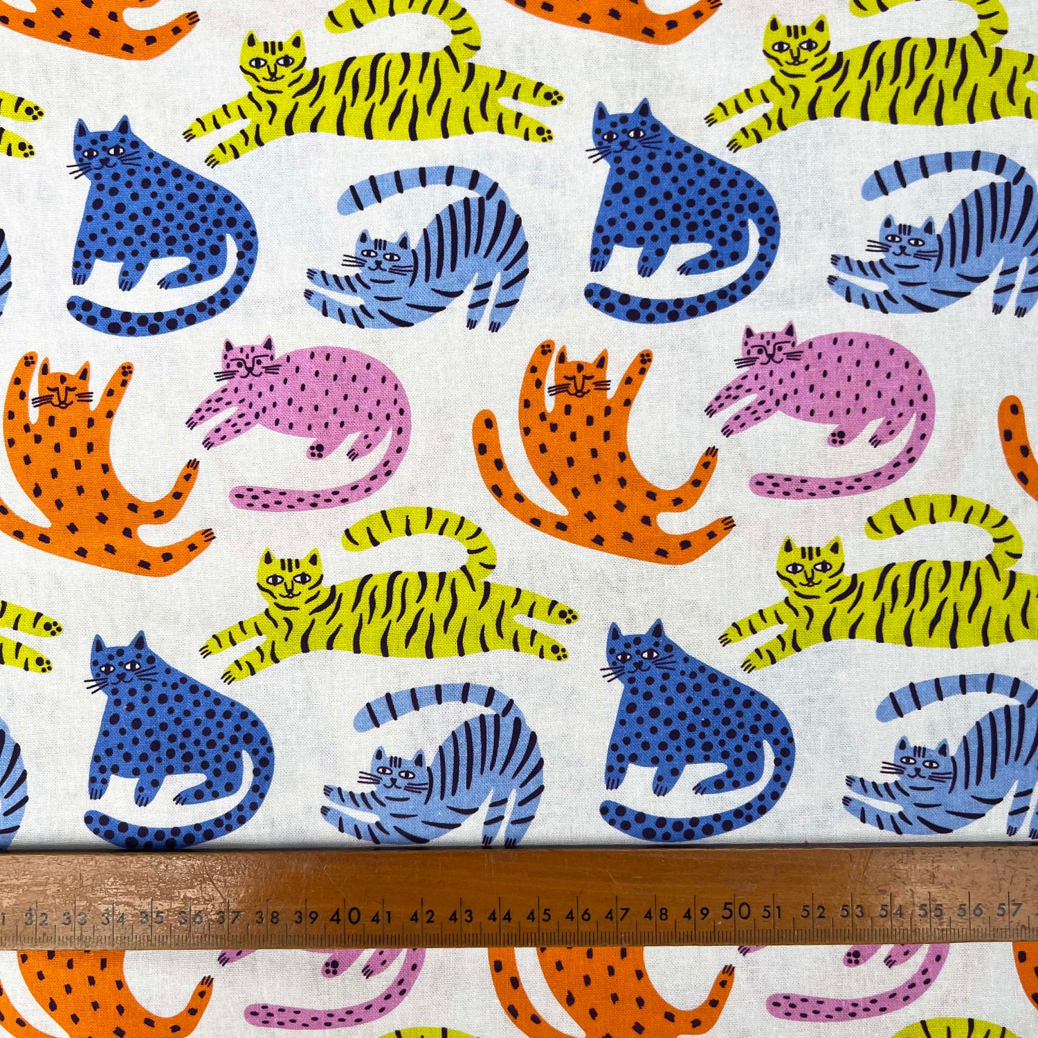 Cotton Print Lazy Cats White Multicoloured Animal Print Fabric Ruler