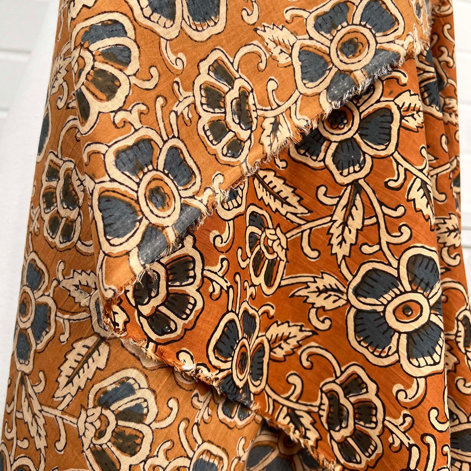 Cotton Voile Diya Orange Floral Abstract Batik Printed Oeko Tex Fabric Fold