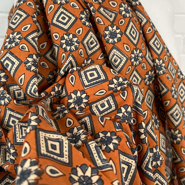 Cotton Voile Kiara Orange Abstract Batik Printed Oeko Tex Fabric Close Up
