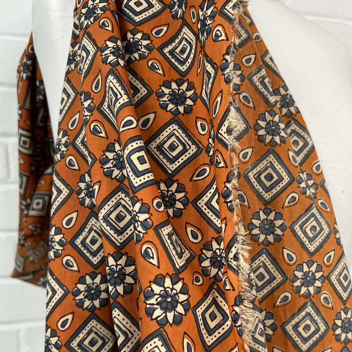 Cotton Voile Kiara Orange Abstract Batik Printed Oeko Tex Fabric Mannequin