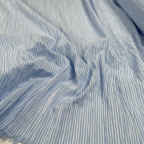 Crinkle Seersucker Stripe Light Blue Cotton Polyester Elastane White Woven Dress Fabric Close Up