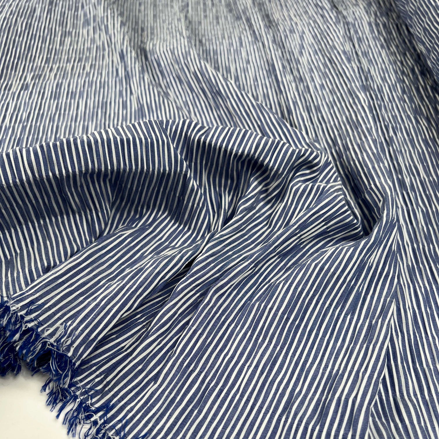 Crinkle Seersucker Stripe Blue Cotton Polyester Elastane White Woven Dress Fabric Close Up