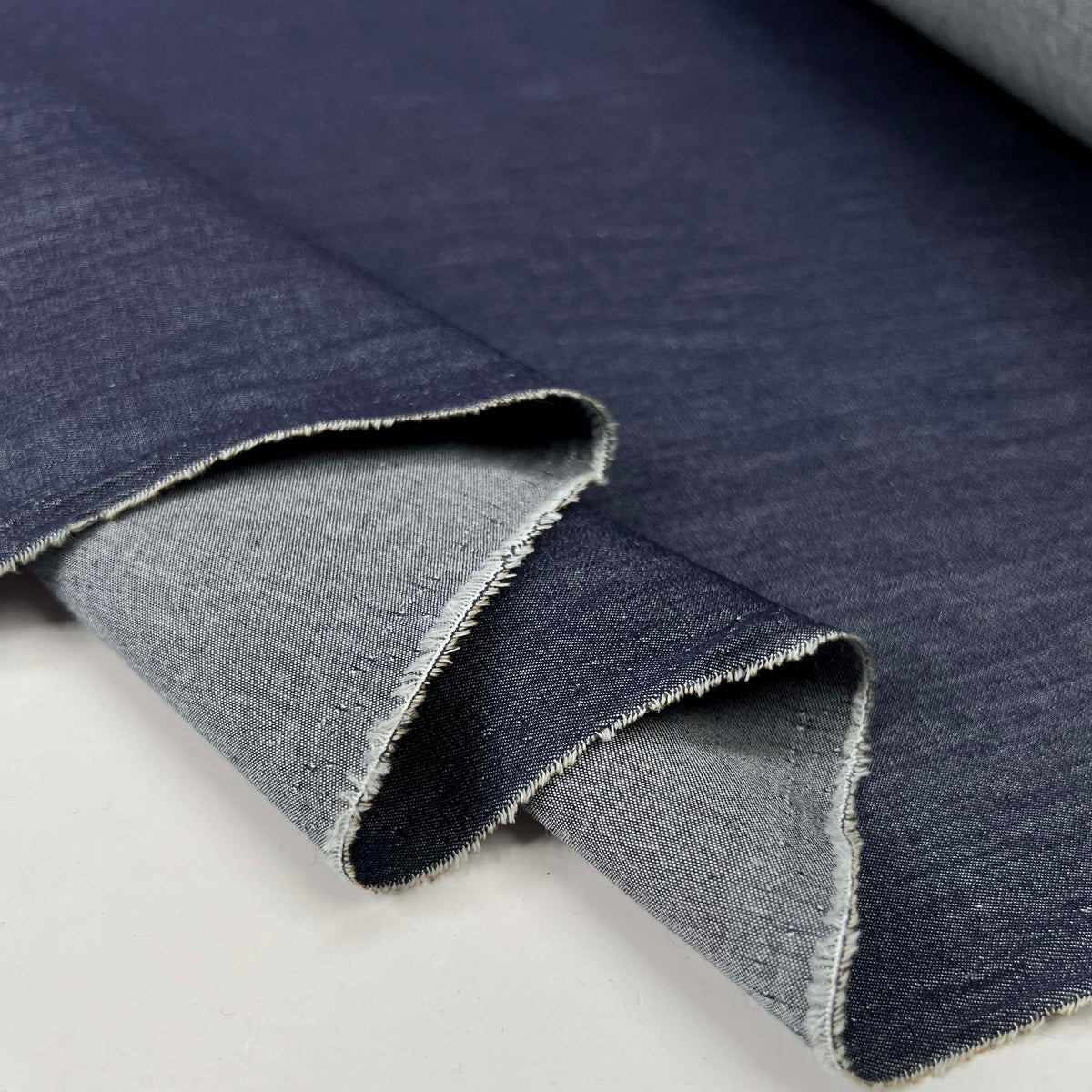 Dark Acres Combed Cotton 4oz Lightweight Blue Chambray Denim Shirting Fabric Fold