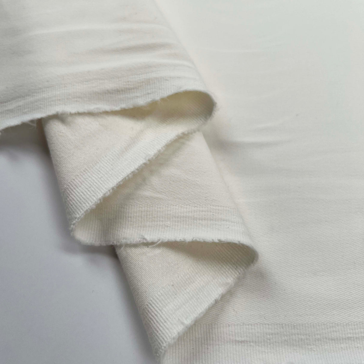 Italian Ex-Designer Soft Cream Cotton Stretch Twill Fabric Delitelli Fold
