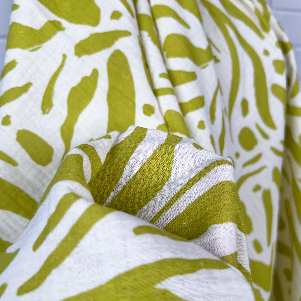 Double Gauze Limes and Cream Cotton Dress Fabric Close up