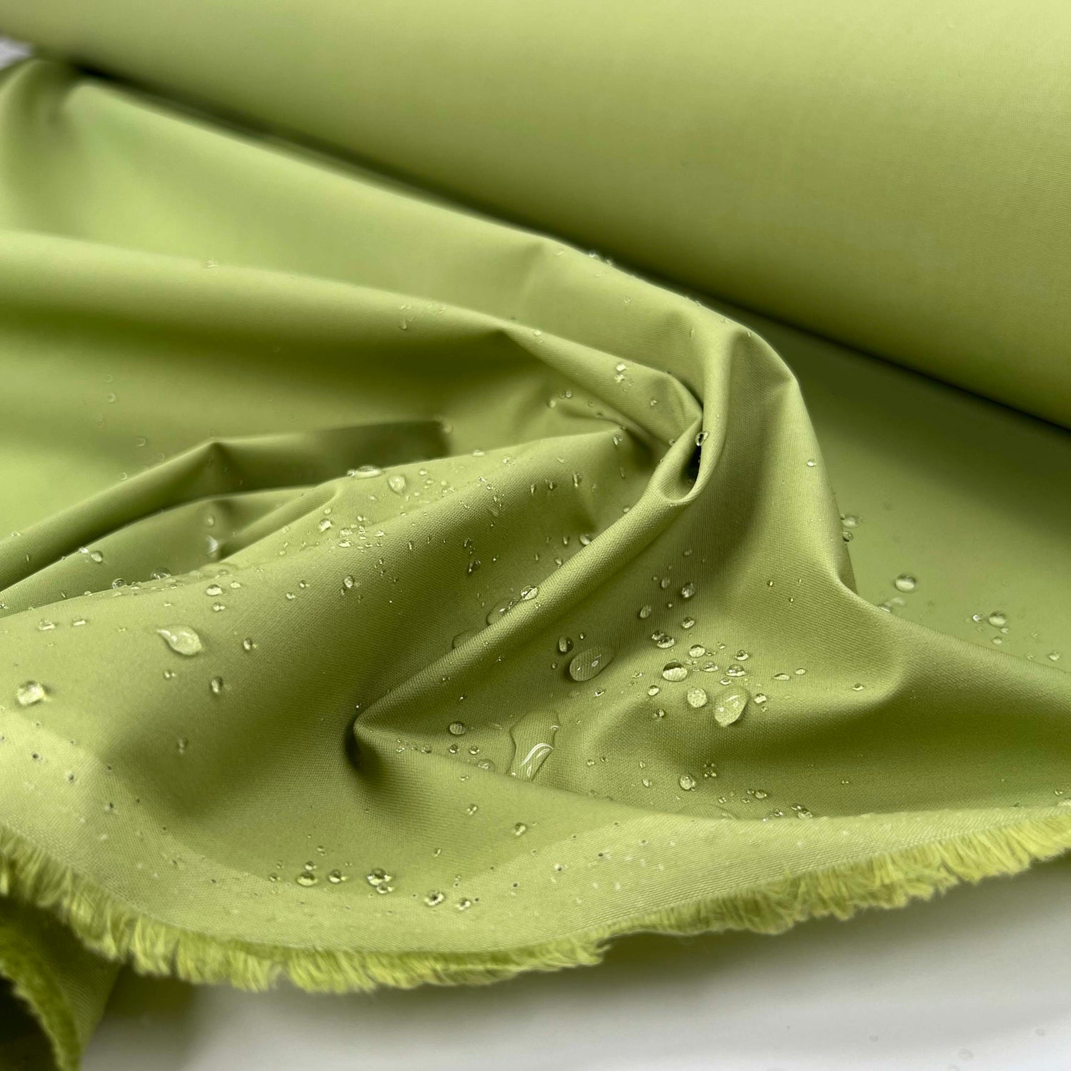 Driden Romano 8oz Waxed Cotton Apple Green British Millerain Fabric Splash