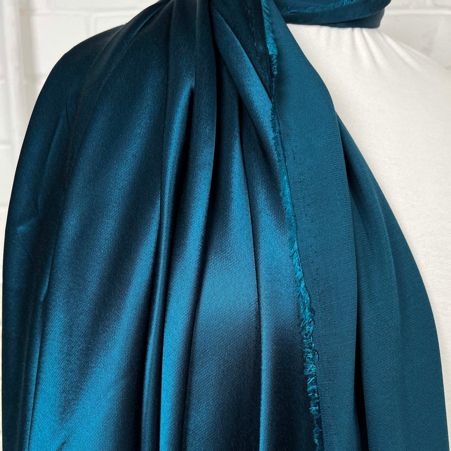 Eternal Satin Teal Viscose Italian Plain Woven Dress Fabric Fold