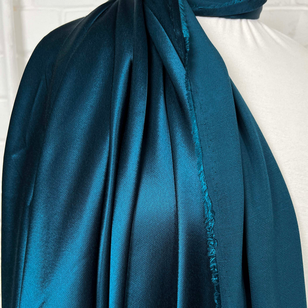 Eternal Satin Teal Viscose Italian Plain Woven Dress Fabric Fold