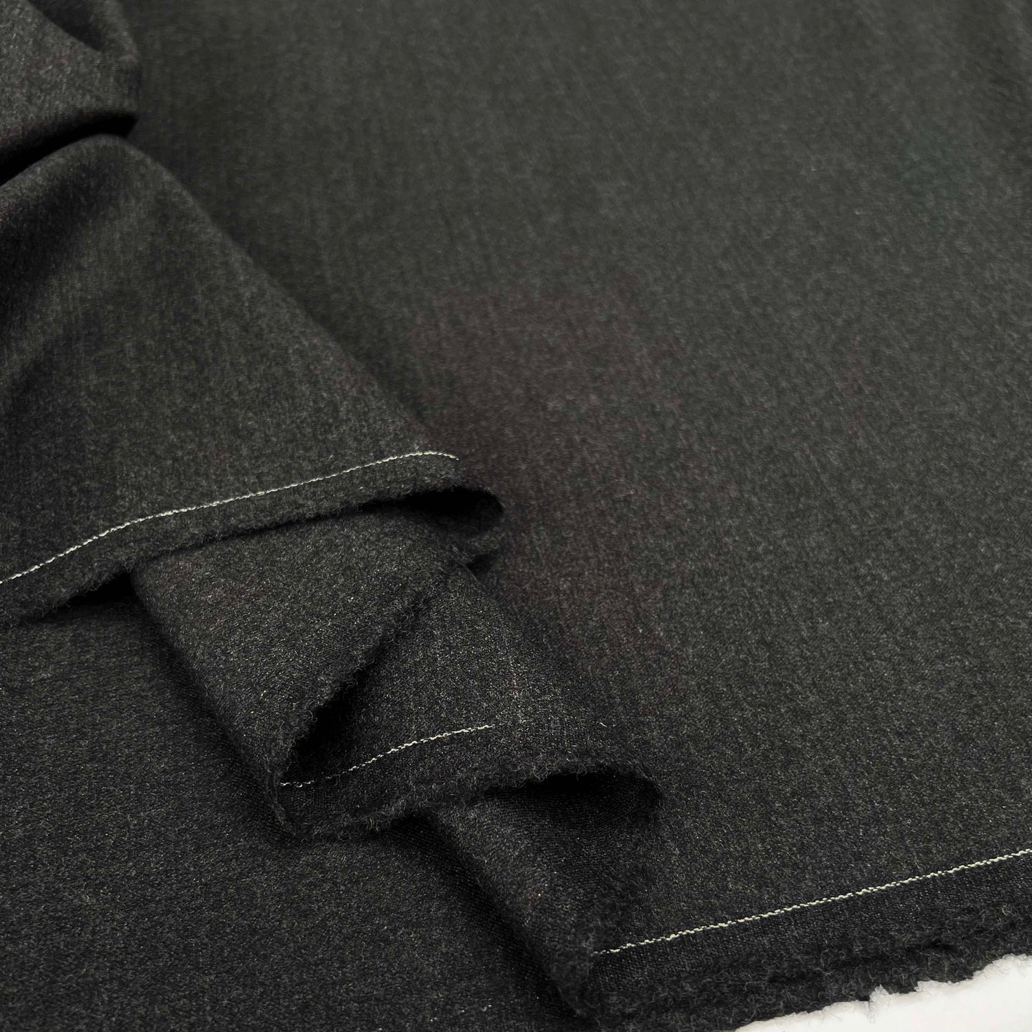 Charcoal Grey Wool Lycra Stretch Suiting Fabric Exceedingly Smart Fold 
