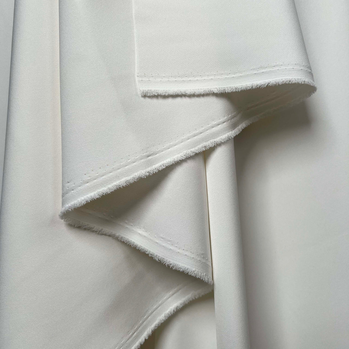 Polyester Elastane Stretch Suiting Crepe Fabric Femme Fatale Ivory Hang