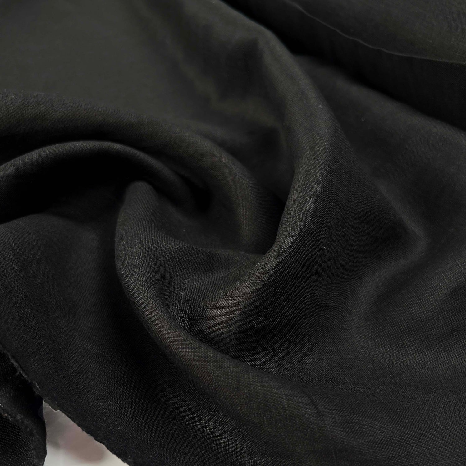 French_Linen_Black_Plain_Woven_Dress_Fabric_Close-up