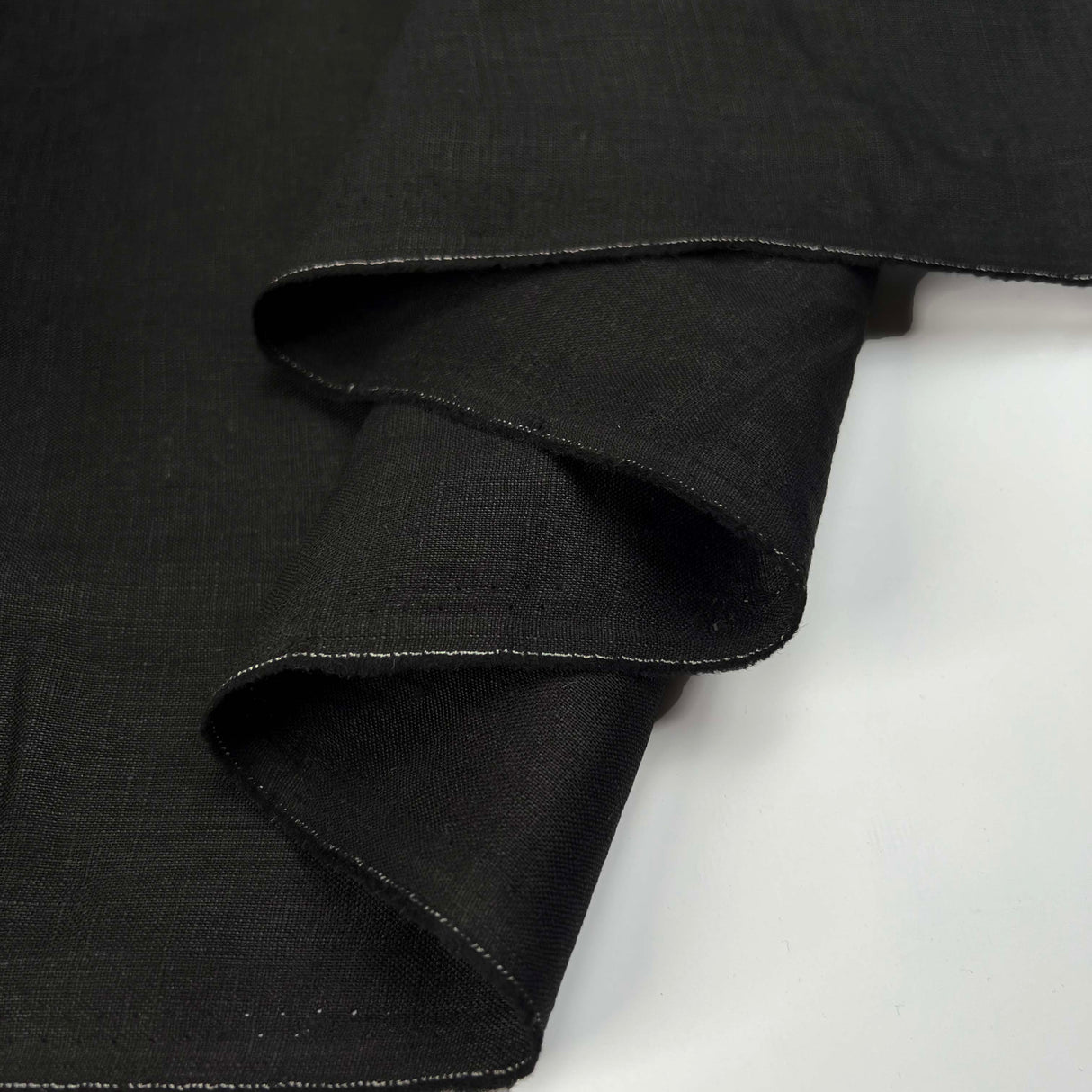 French_Linen_Black_Plain_Woven_Dress_Fabric_Fold