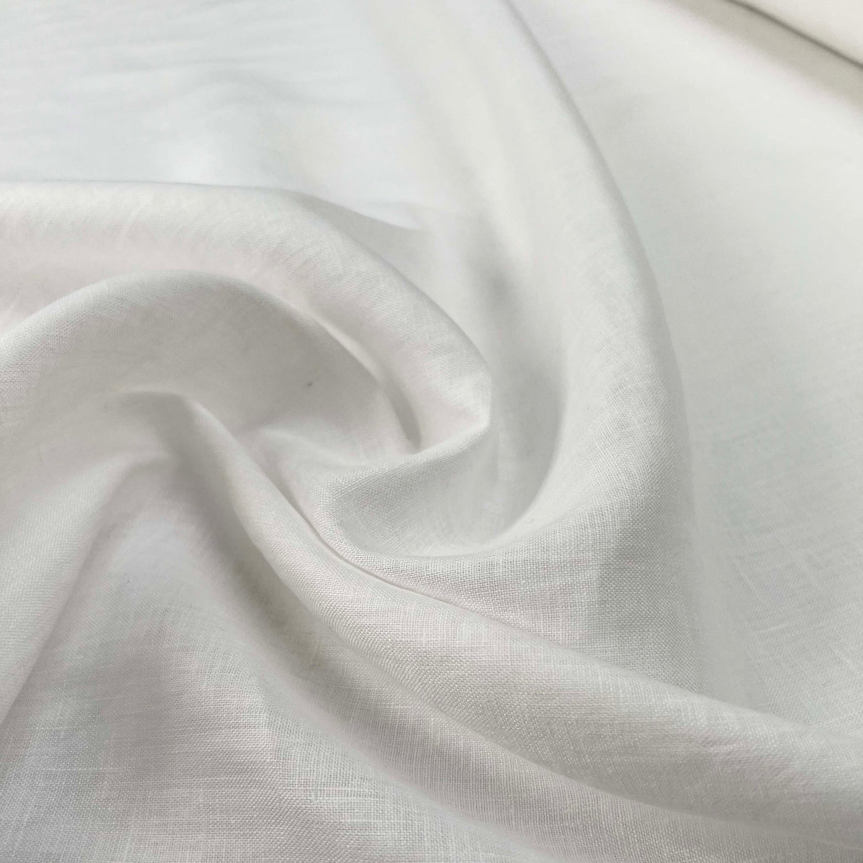 French_Linen_White_Plain_Woven_Dress_Fabric_Close-up