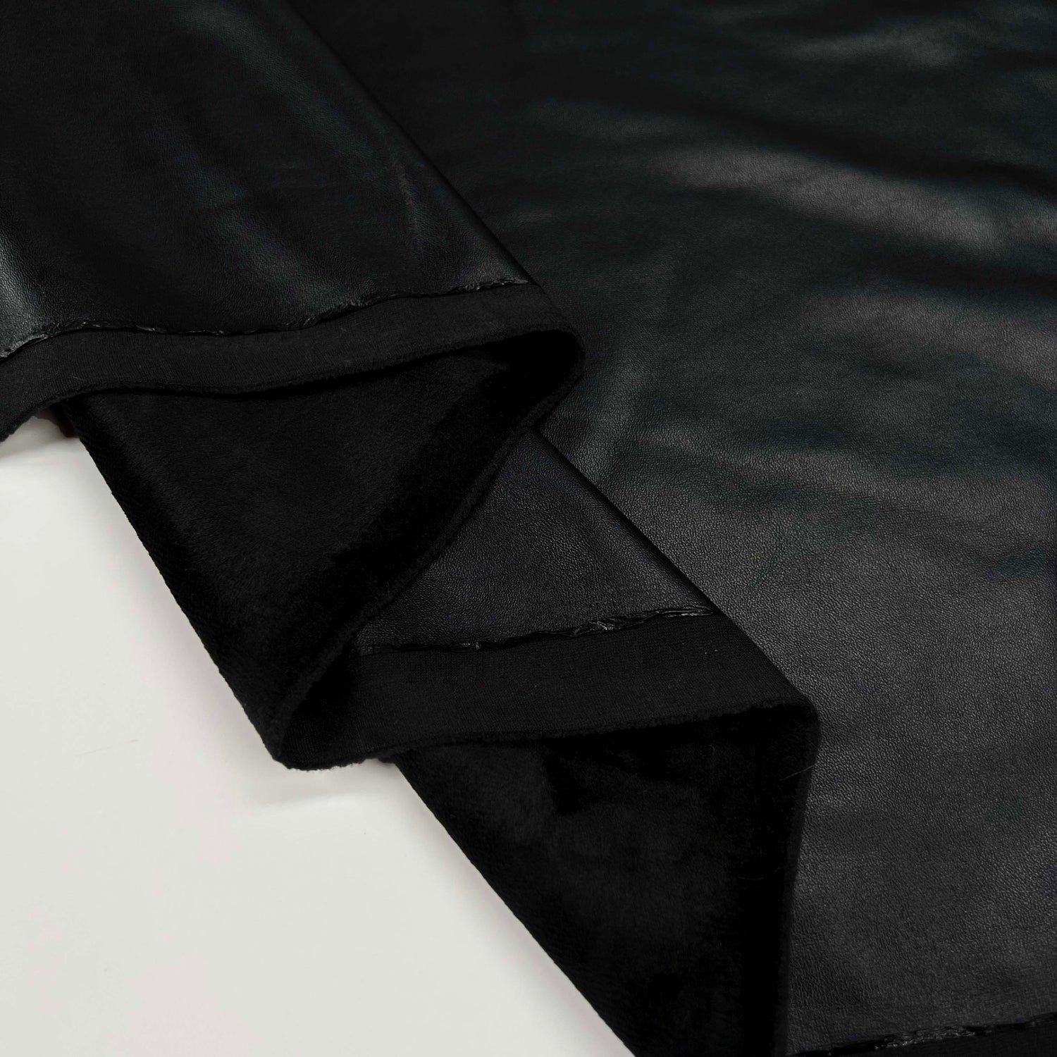 Fur Backed Faux Leather - Black Fabric
Fold