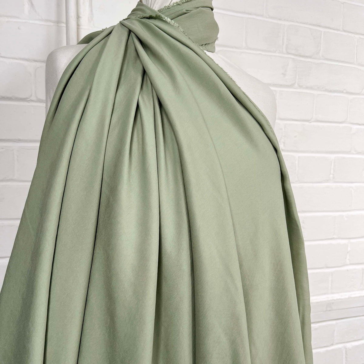 Gentle Green Modal Recycled Polyester Dress Fabric Mannequin