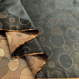 Khaki Gold Circles Polyester Dressmaking Fabric Golden Hour Fold