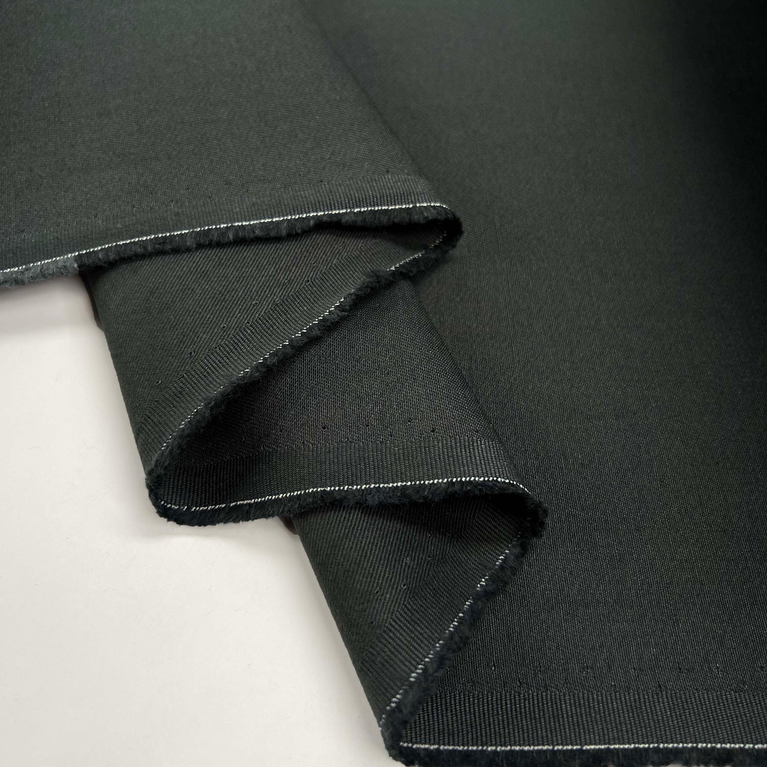 Grey But Not Boring Graphite Cotton Plain Woven Trouser Fabric fold