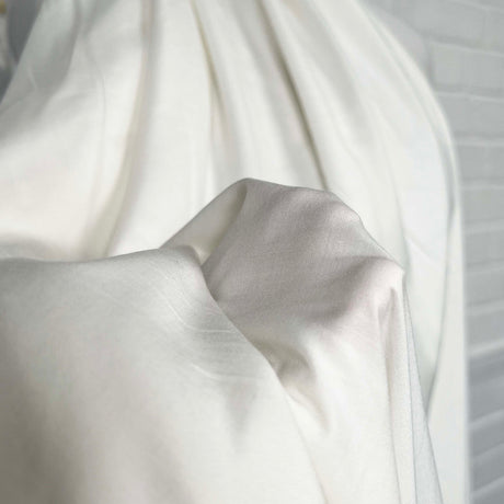 La Dolce Viscose Plain Woven Cream Ex Designer Deadstock Shirting Fabric Close Up