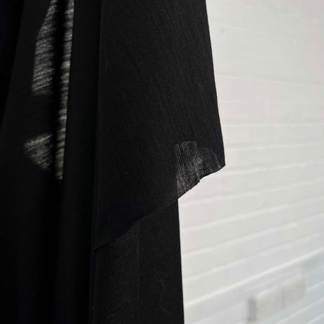 Lana Suprema Virgin Wool Black Stretch Sheer Knit Jersey Fabric Hang