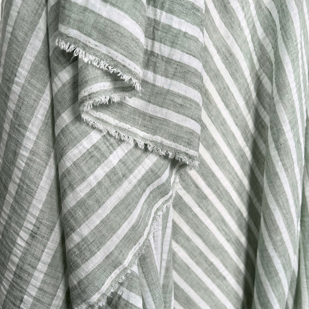 Linen Look Stripe Sage White Polyester Woven Shirting Fabric Hang