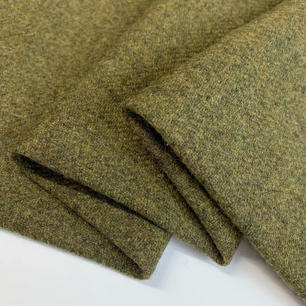 Merino Lambswool – Olive British Suiting Fabric Fold