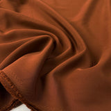 Metro_Stretch_Brick_Polyester_Elastane_Plain_Dress_Fabric_Close_Up