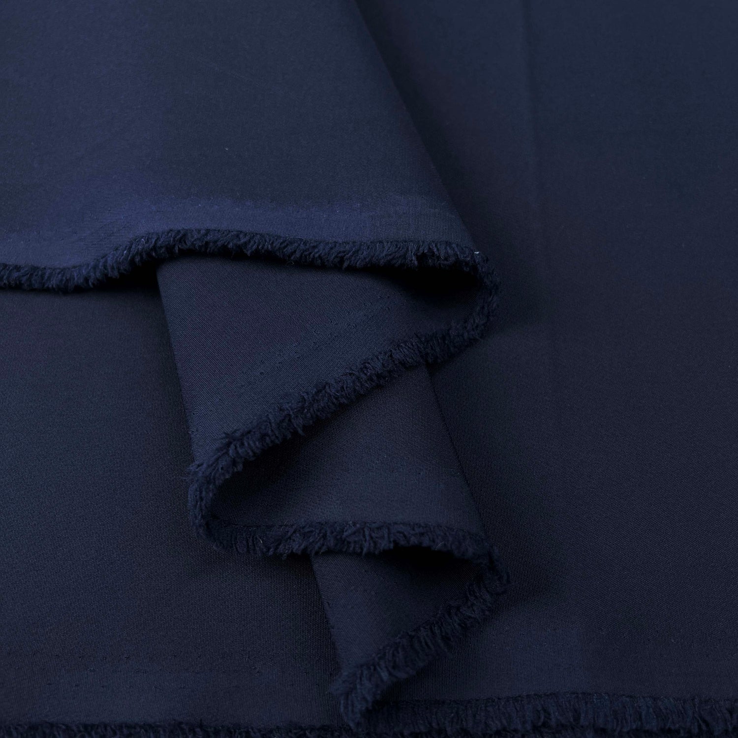 Metro_Stretch_Navy_Polyester_Elastane_Plain_Dress_Fabric_Fold