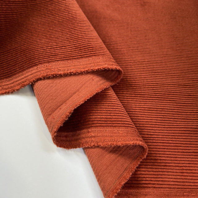 Milano Cord Rust Cotton Elastane 10 Wale Italian Ex Designer Stretch Woven Trouser Fabric Fold