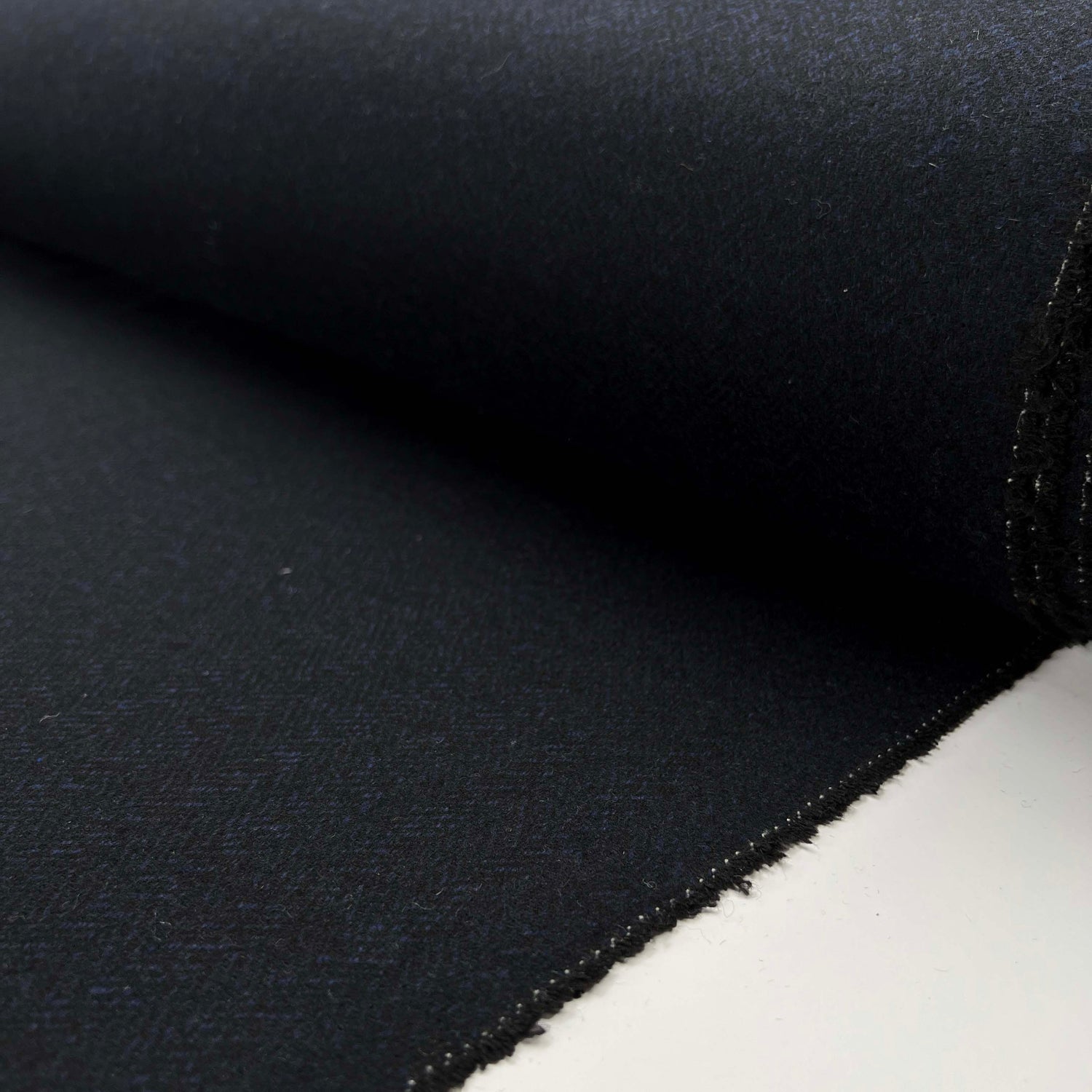 Moody Blues Polyester Wool Mix Blue Black Herringbone Suiting Fabric Roll