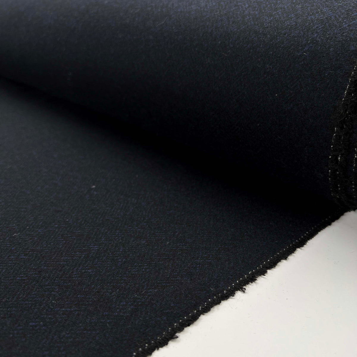 Moody Blues Polyester Wool Mix Blue Black Herringbone Suiting Fabric Roll