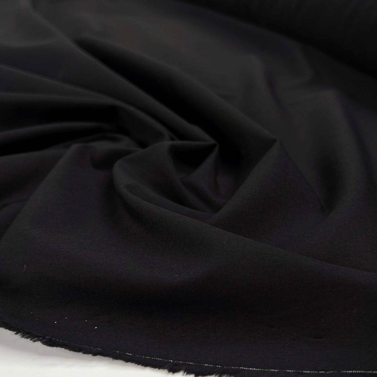 Nice n Black Cotton Plain Woven Shirting Fabric Close up