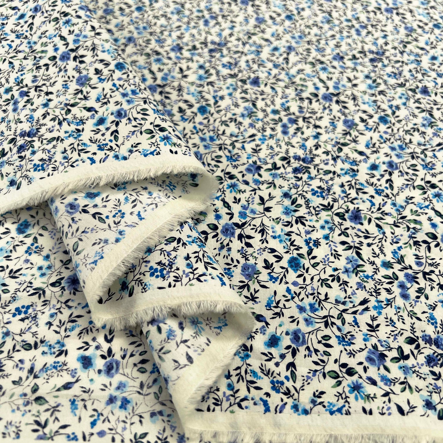 Tiny Blue Floral Print Dressmaking Fabric Pima Cotton Lawn Floret Fold