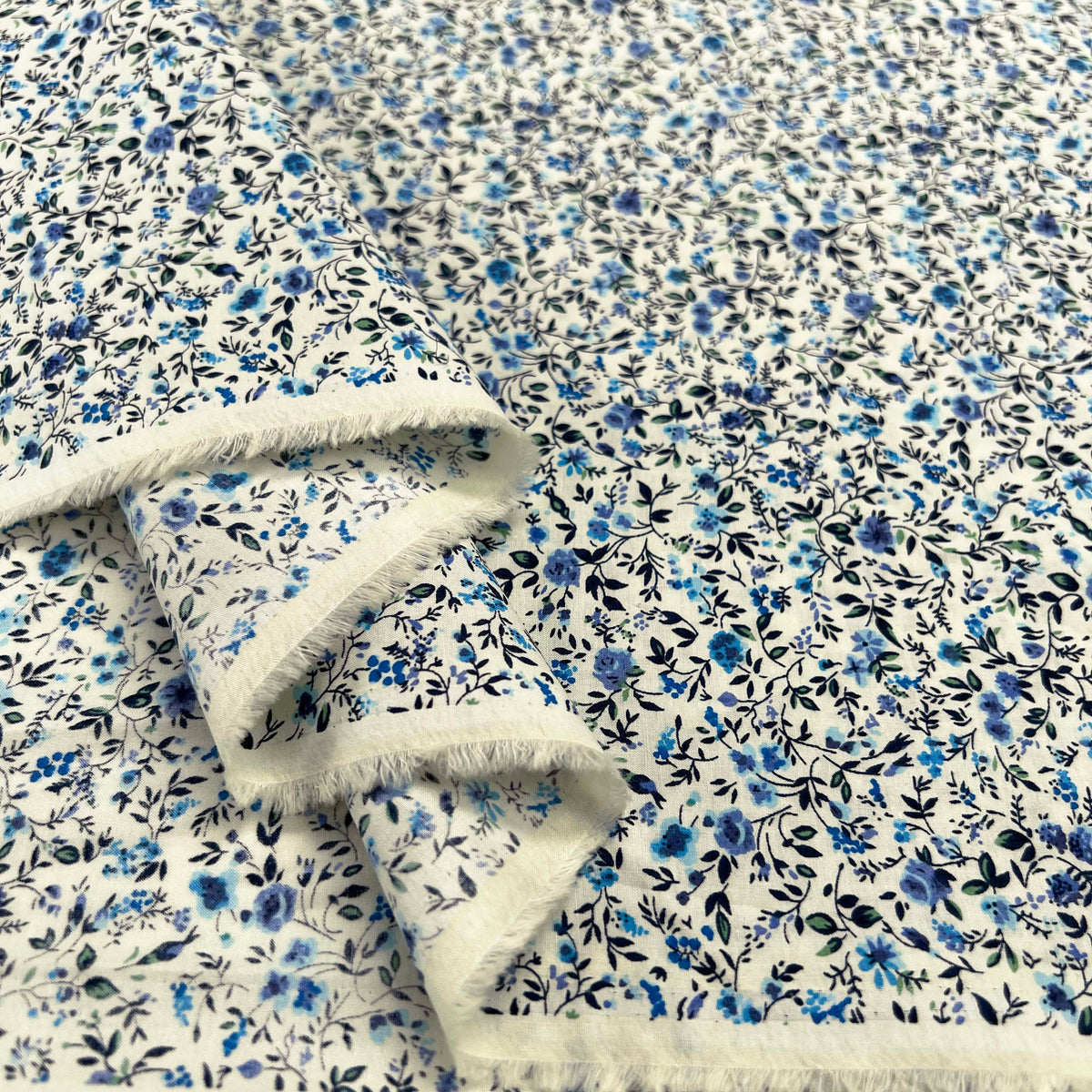 Tiny Blue Floral Print Dressmaking Fabric Pima Cotton Lawn Floret Fold