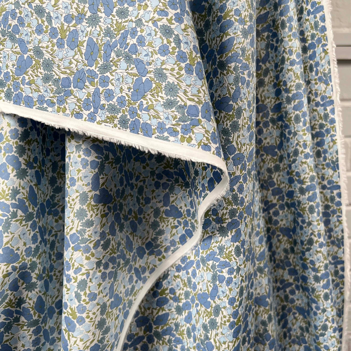 Printed Floral Dress Fabric Pima Cotton Lawn Flower Parade Blue Hang
