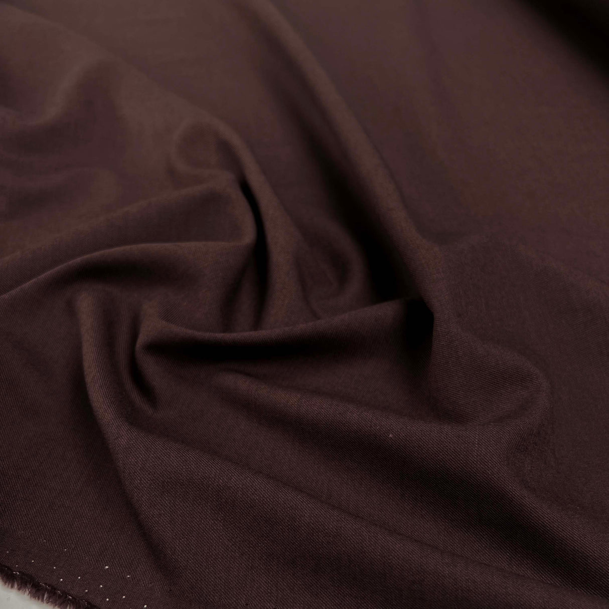Plum Duff Wool Cotton Damson Plain Woven Suiting Fabric Close Up