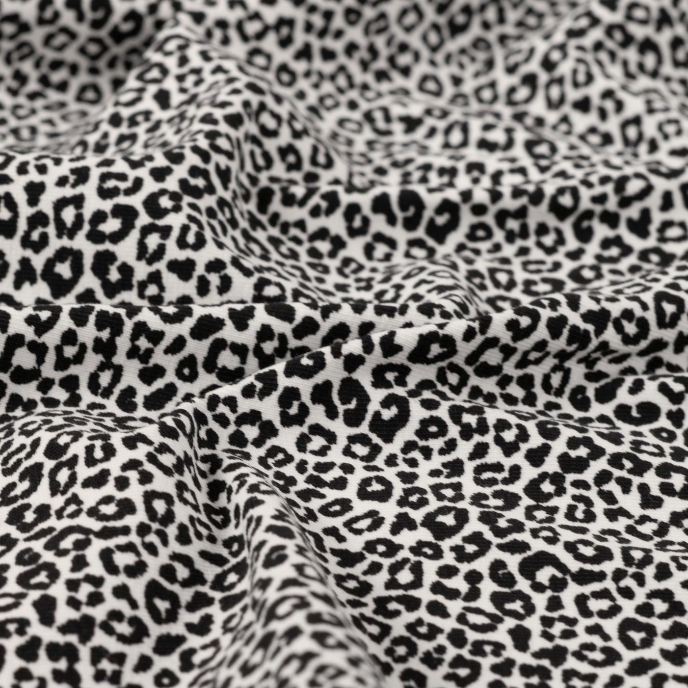 Pocket Panther Ecru Animal Print Knitted Cotton Jersey 200gsm Dress Fabric CU