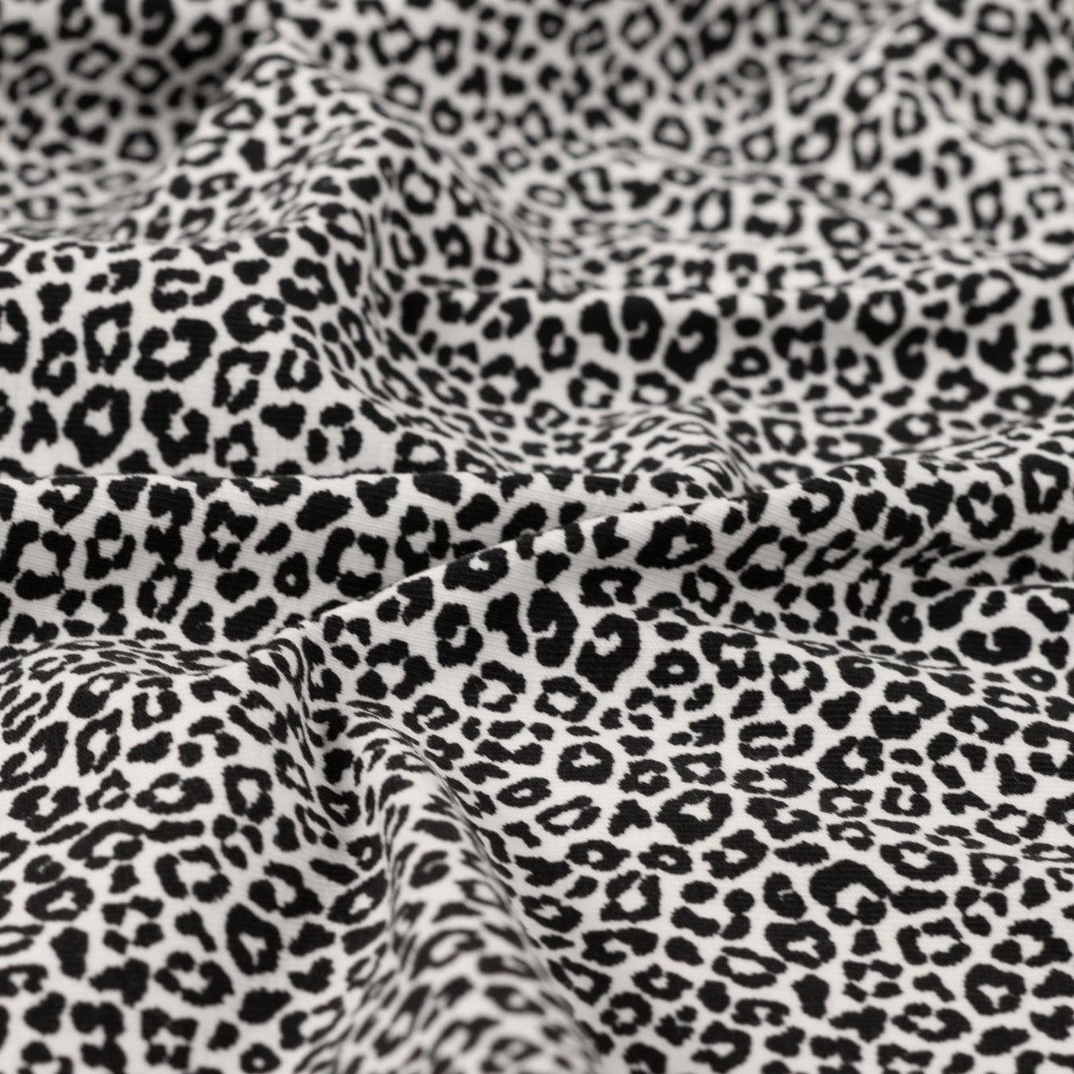 Pocket Panther Ecru Animal Print Knitted Cotton Jersey 200gsm Dress Fabric CU