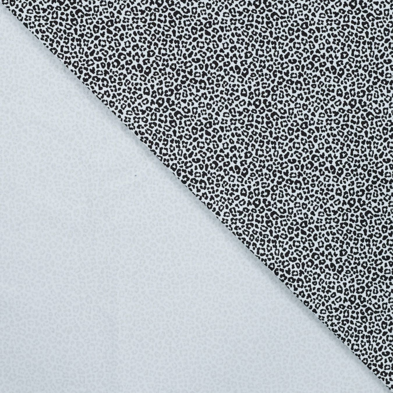 Pocket Panther Haze Animal Print Knitted Cotton Jersey 200gsm Dress Fabric Fold