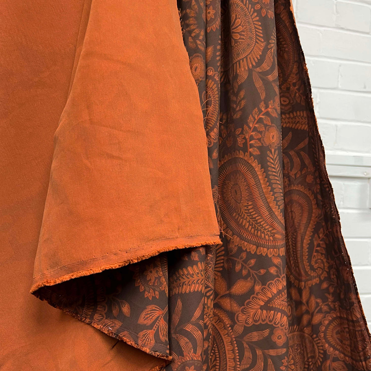 Roman Holiday Cupro Viscose Italian Paisley Rust Dress Fabric Hang