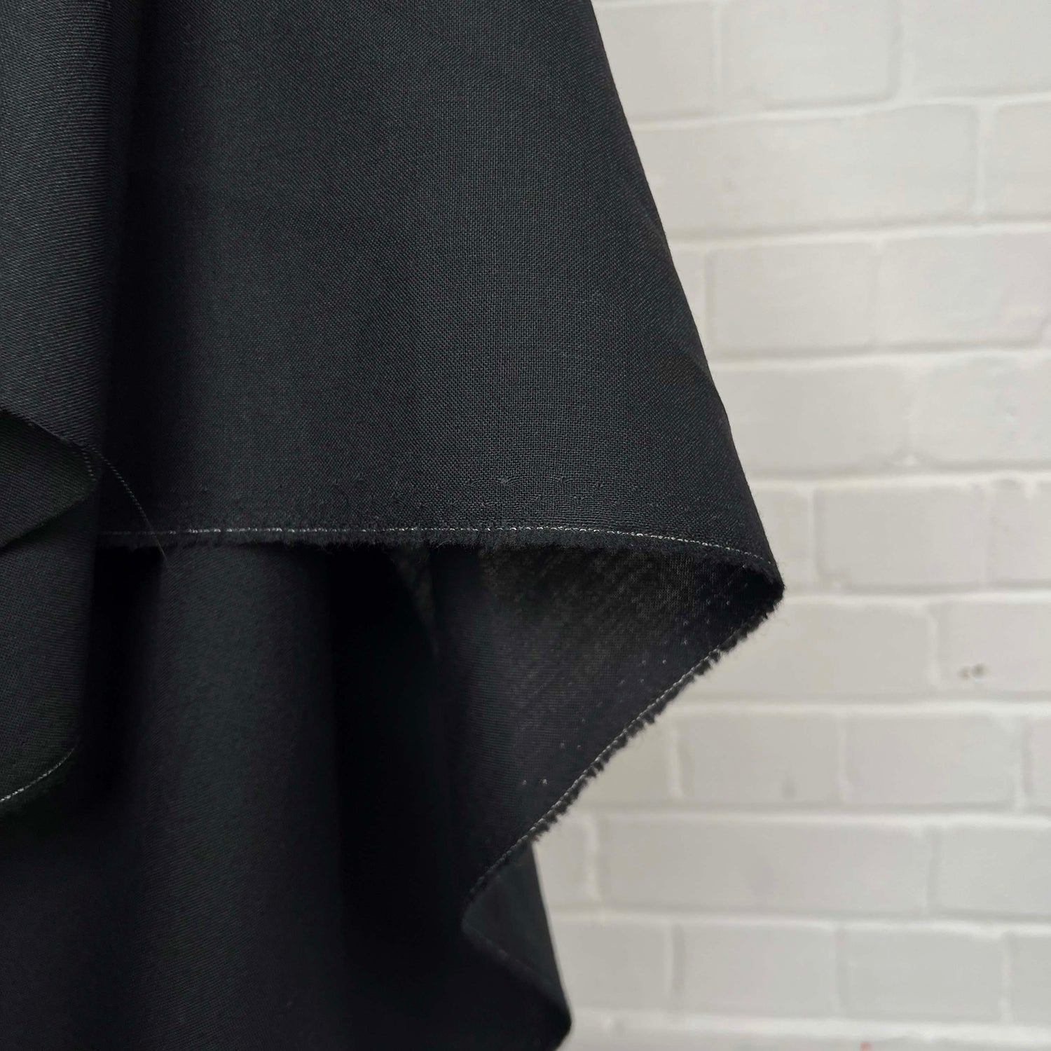 Black British Wool Deadstock Suiting Dress Fabric Sackville Street Hang