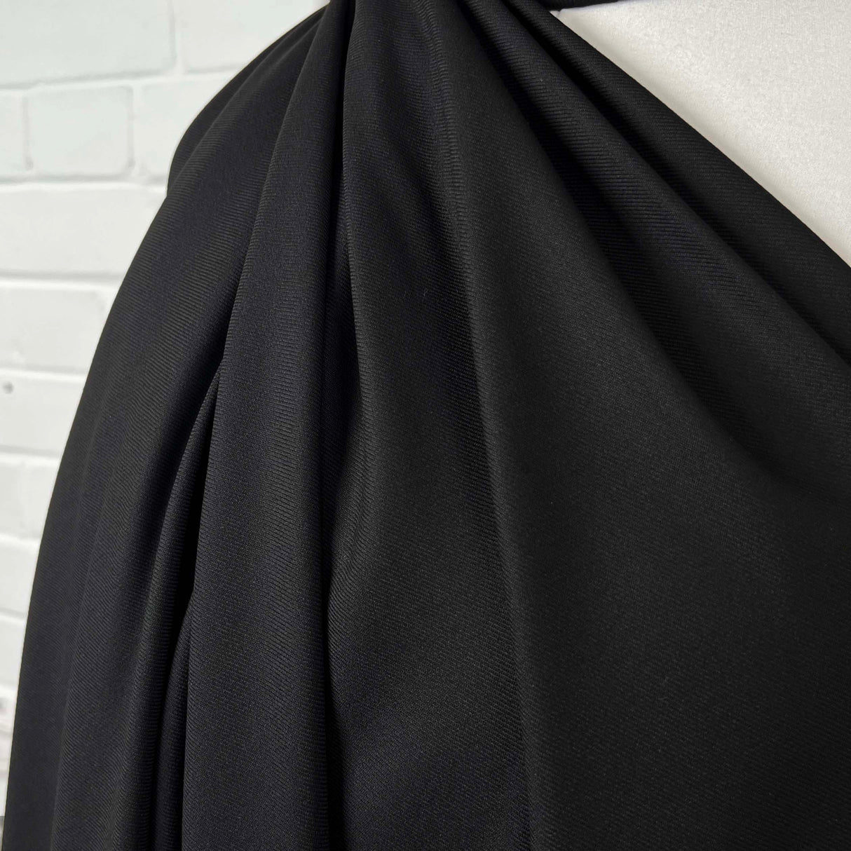 Smart Easy Polyester Viscose Elastane Black Stretch Woven Suiting Fabric Close Up