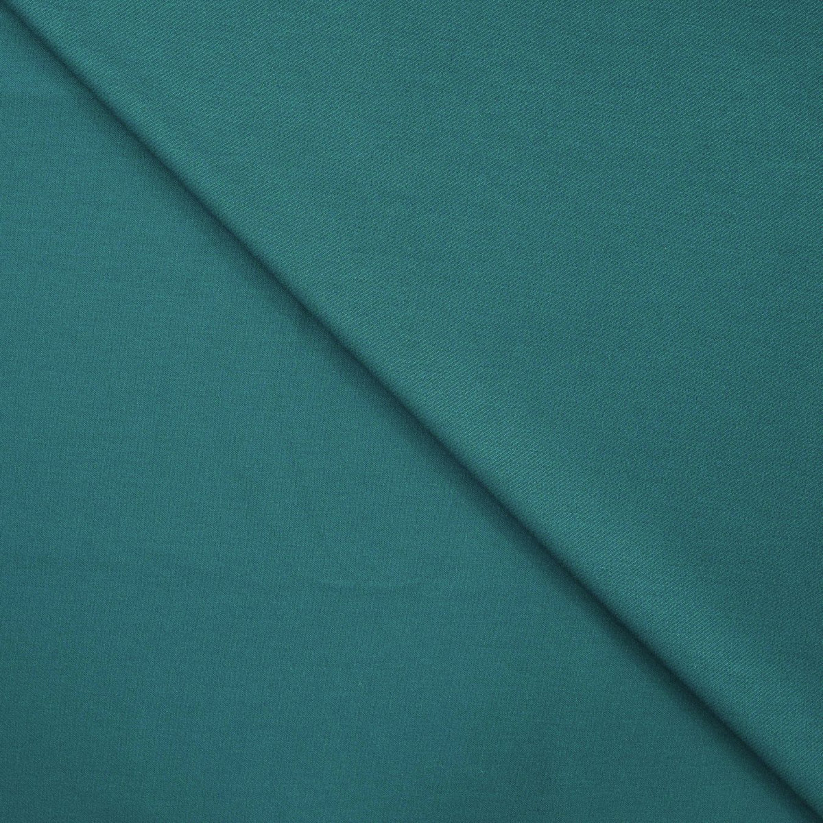 Smart Move Petrol Punta Twill Knitted Viscose 350gsm Dress Fabric Fold