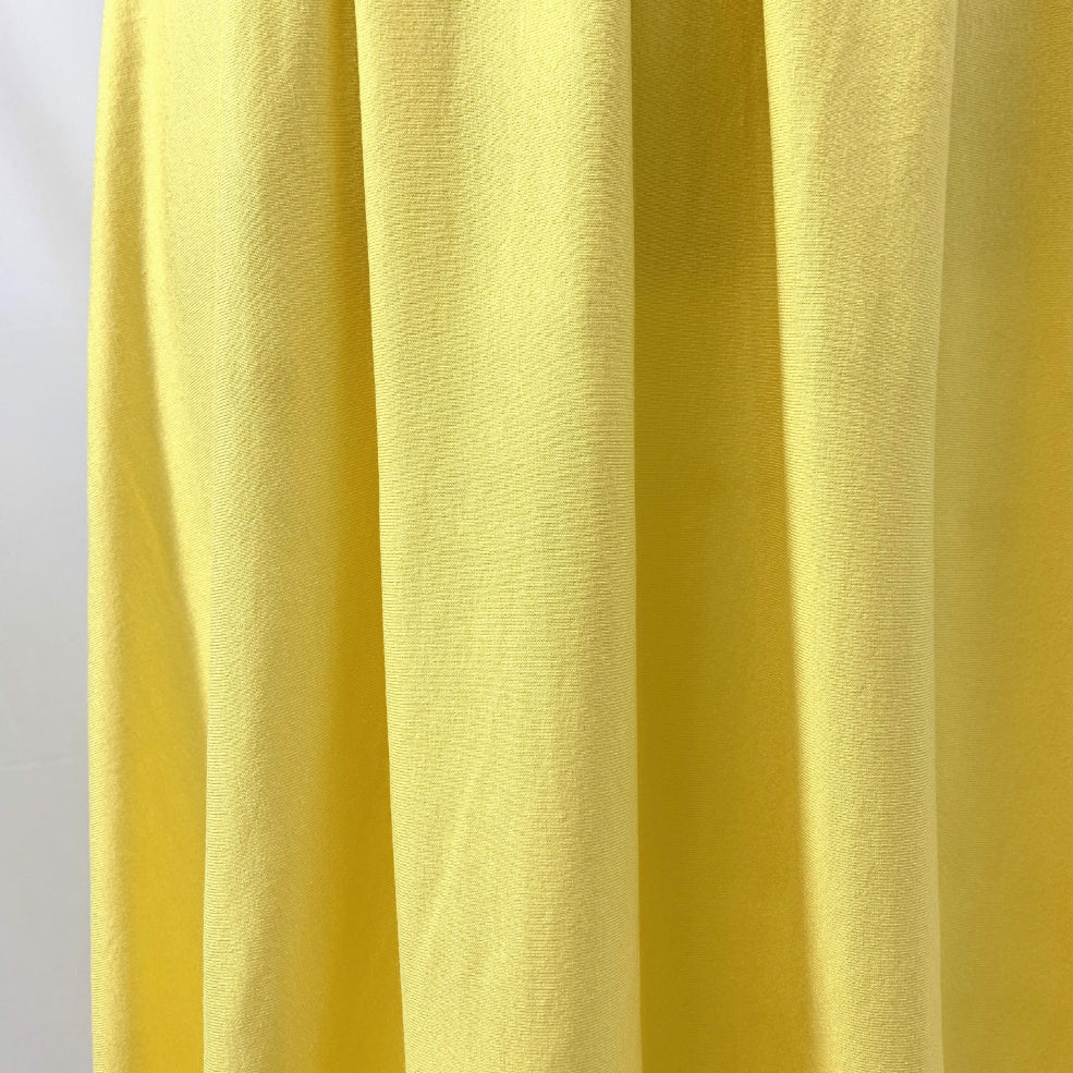 Spongle Yellow Viscose Lycra Knitted Jersey Fabric Drape