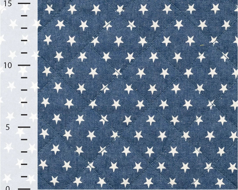 Denim Quilt Stars Print Blue Quilted Cotton Dress Fabric fabric, with ruler for scale