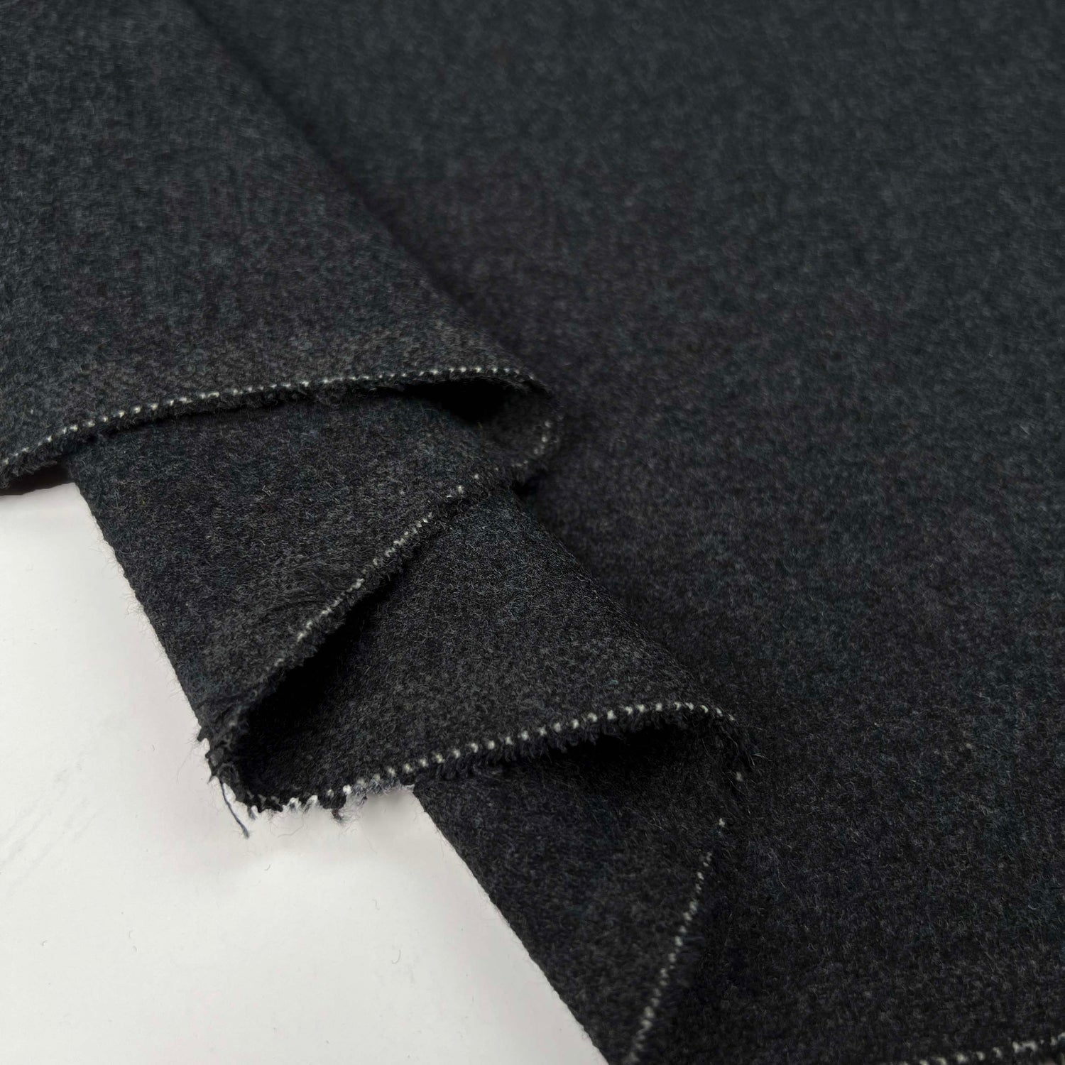 Wool & Polyester Mix Grey Marl Suiting Fabric Survival Instincts Fold