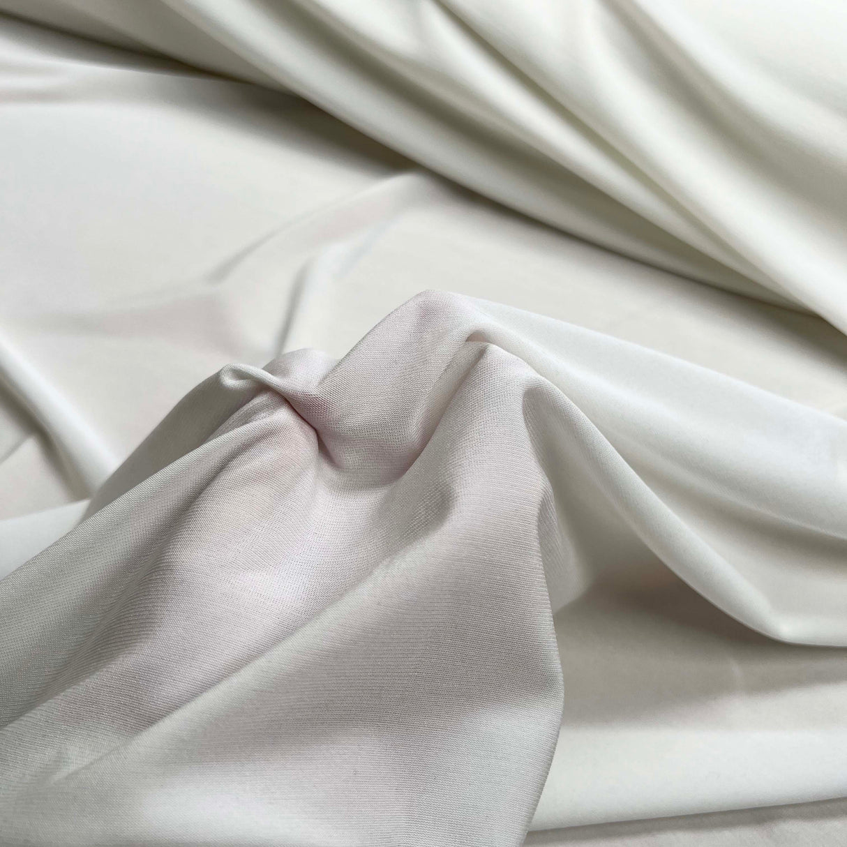 White Fine Nylon Jersey Dressmaking Fabric A Long Stretch CU