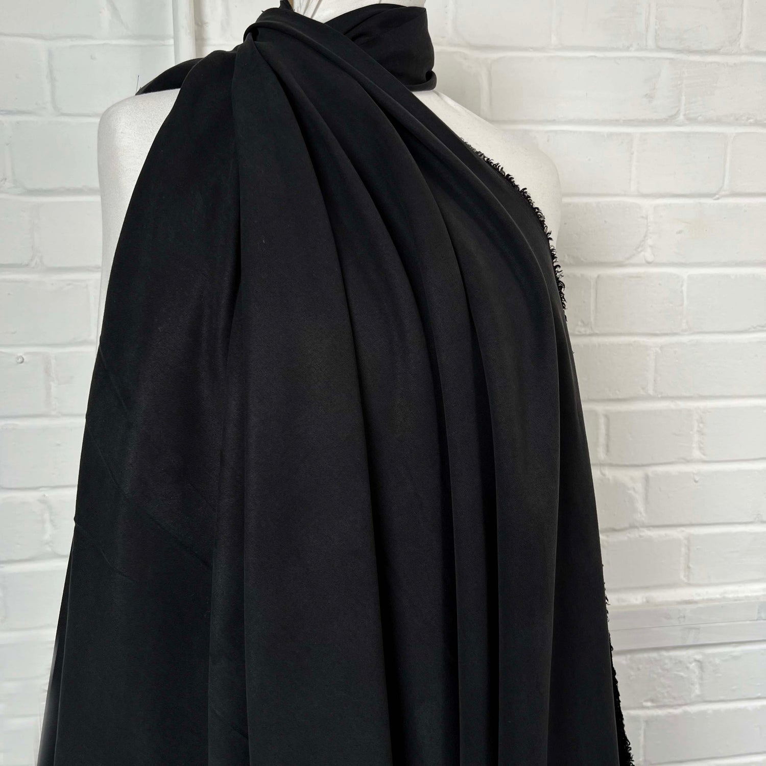 Tremendous Black Tencel Plain Woven Dress Fabric Mannequin