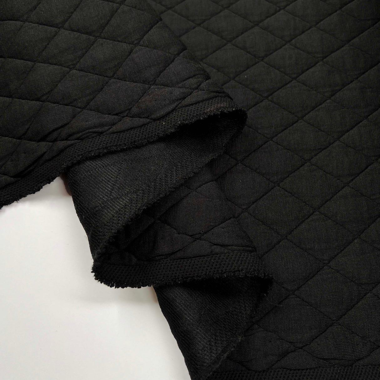 Urban Quilted Jersey Black Polyester Viscose Elastane Knitted Diamond Quilt Fabric Fold