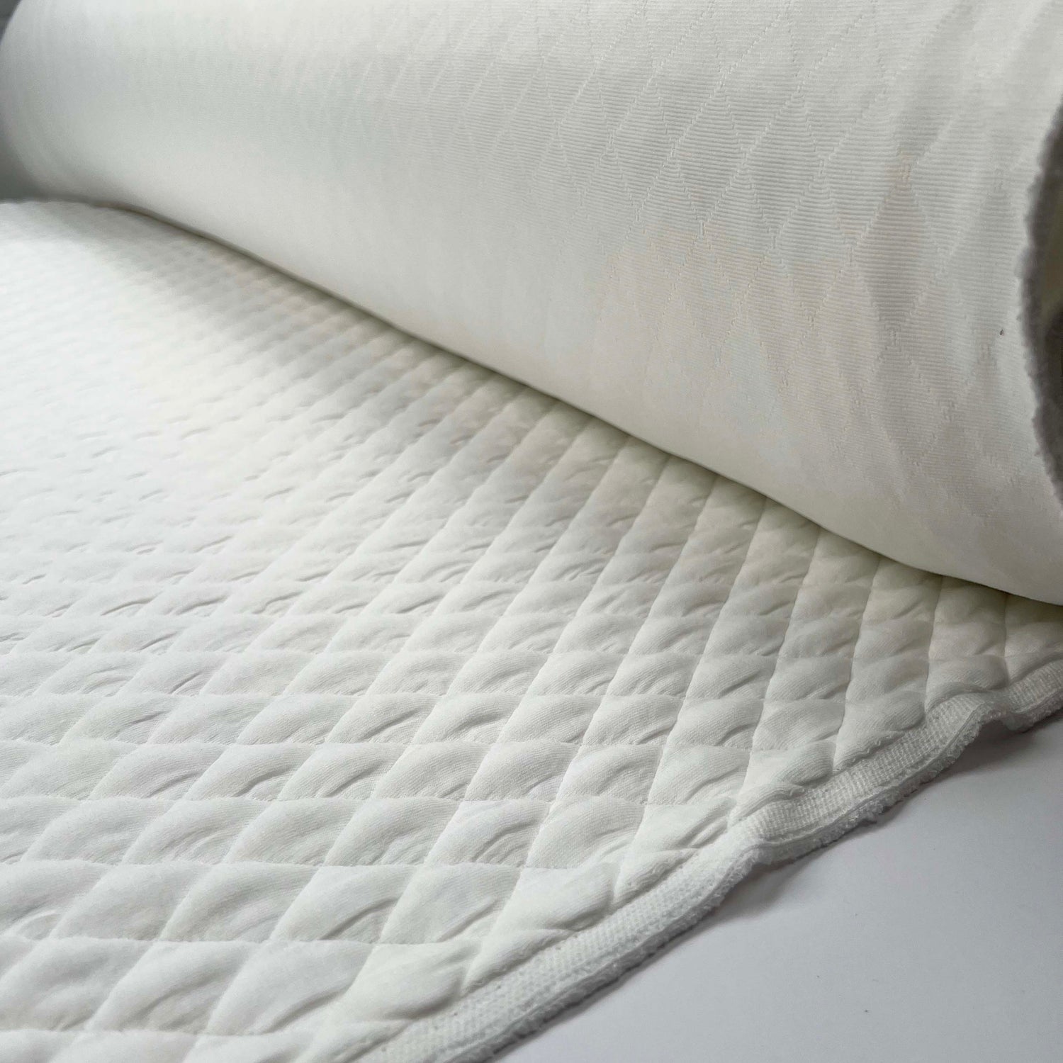 Urban Quilted Jersey Ivory Polyester Viscose Elastane Knitted Diamond Quilt Fabric Roll